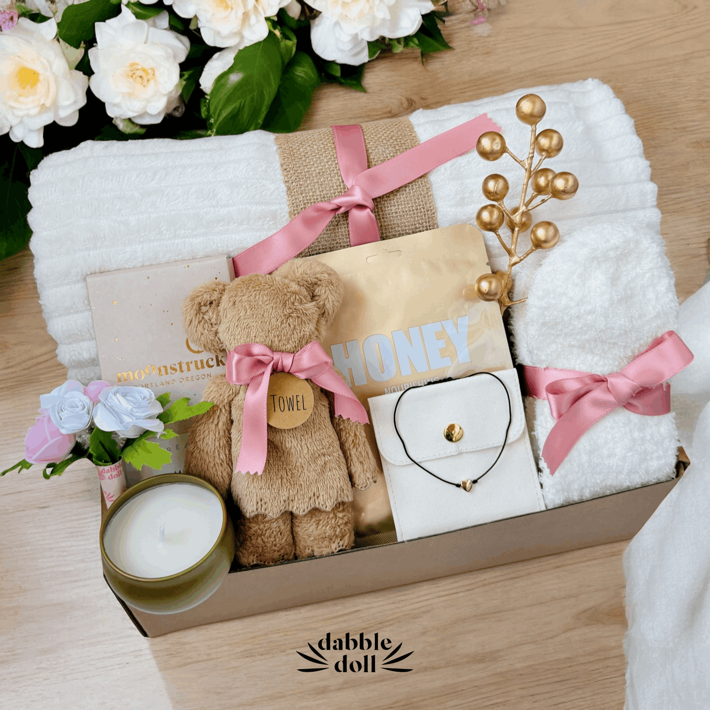 Dabble Doll hygge gift box for women with cozy towel bear candle and floral accents