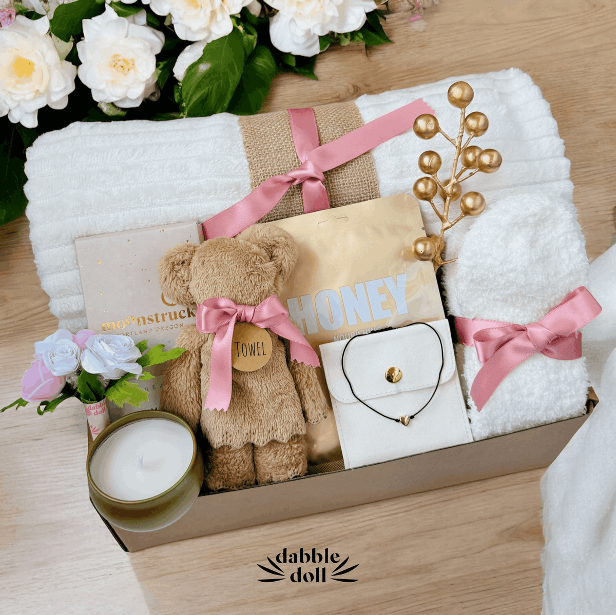 Dabble Doll hygge gift box for women with cozy towel bear candle and floral accents
