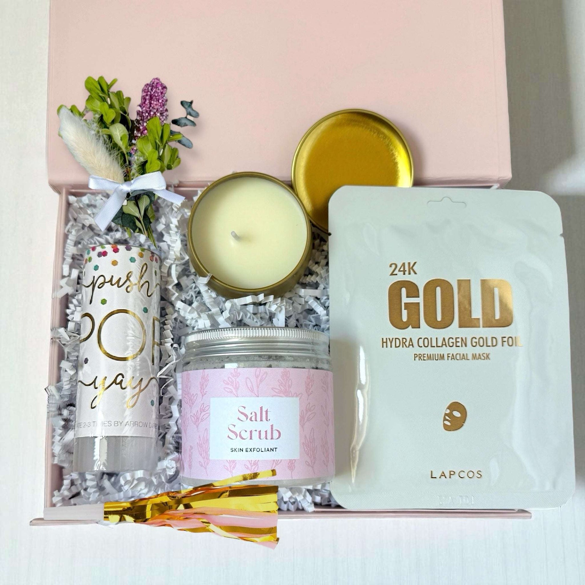 Dabble Doll luxury pink celebration gift set with salt scrub candle and gold collagen face mask