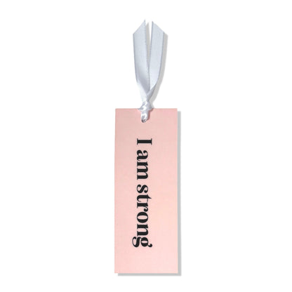 Dabble Doll Gift Box featuring a motivational bookmark with 'I am strong' in elegant lettering