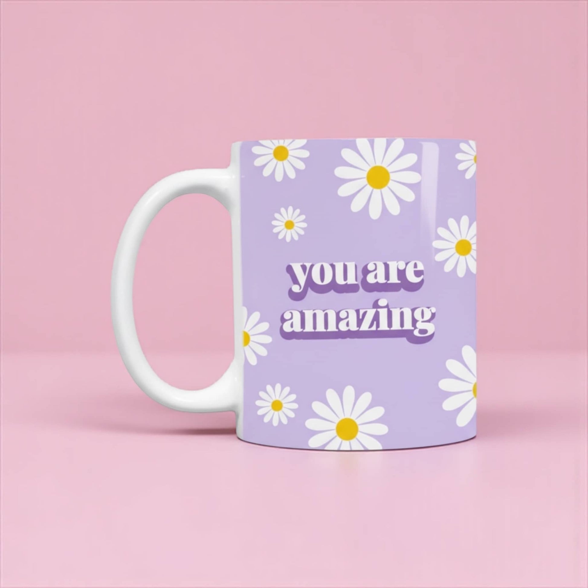 Dabble Doll purple mug with daisies and the phrase you are amazing for positive vibes