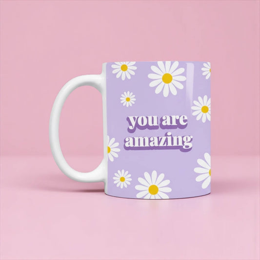 Dabble Doll purple mug with daisies and the phrase you are amazing for positive vibes