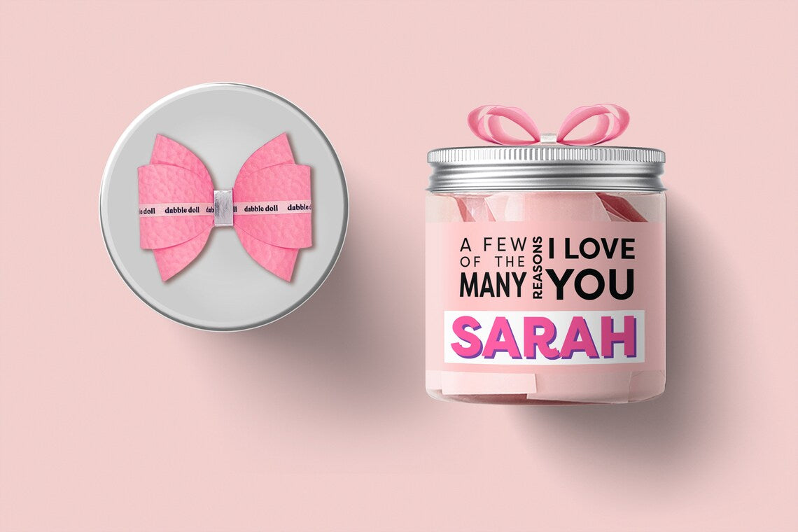 Personalized gift set for girls featuring a pink bow and candle labeled with 'Sarah' for women and ladies