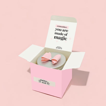 Pink Dabble Doll gift box with magical note and bow for women, designed as a personalized gift