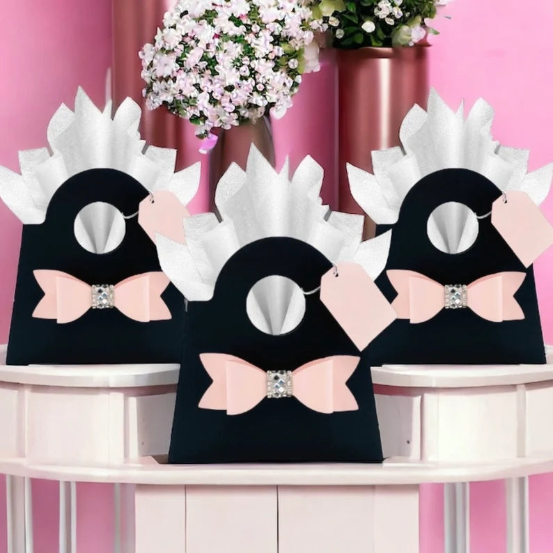 Dabble Doll stylish black purse bag with pink bow accent, perfect for girls and women.