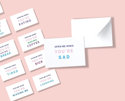 Colorful 'Read me when' cards for girls with uplifting messages and a white envelope