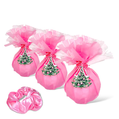 Pink satin scrunchie for girls and women with festive holiday design for cheerful styling