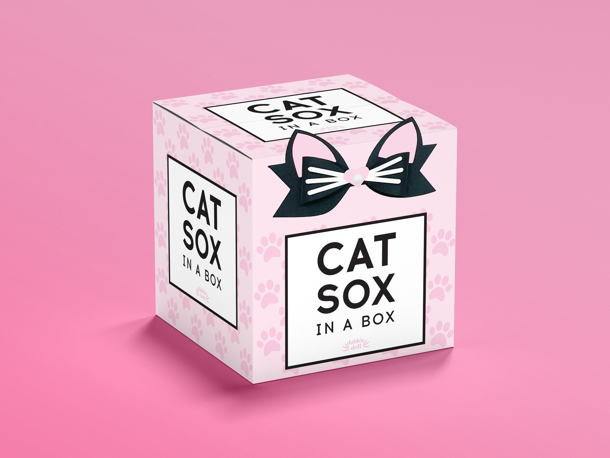 Dabble Doll Cat Sox in a Box featuring a cute design and cat-themed packaging